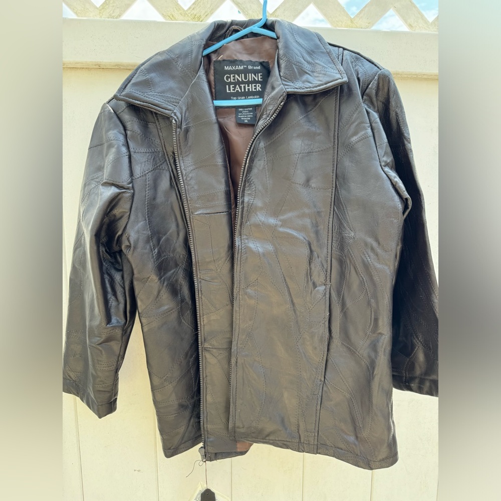 Leather jacket, unworn with tags.